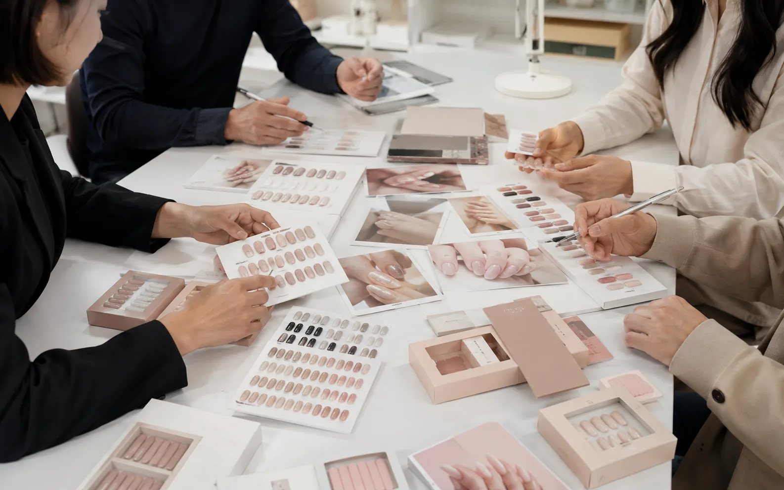 Design review process for press-on nail sample development with reference images and notes